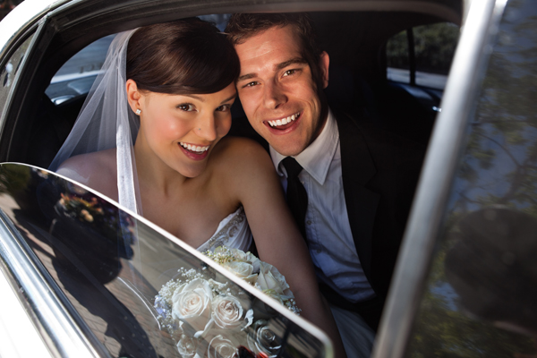 couple-rides-wedding-limo
