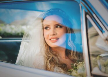 bride sitting in a car
